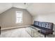 Bonus room featuring a dark-colored leather futon, and a glass-topped coffee table at 341 Sanders St, Indianapolis, IN 46225