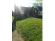 A cozy home with a chimney, tidy lawn, and a neatly paved driveway at 3505 N Layman Ave, Indianapolis, IN 46218