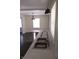 The kitchen features an eating bar illuminated by pendant lights at 3505 N Layman Ave, Indianapolis, IN 46218