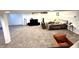 Finished basement includes a living area, bedroom space, and neutral carpet at 4414 Hickory Grove Blvd, Greenwood, IN 46143