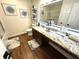 Modern bathroom with granite countertop, decorative wall art, and decorative shelving at 4414 Hickory Grove Blvd, Greenwood, IN 46143