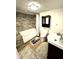 This bathroom boasts a jacuzzi tub, lovely tile and fun rugs at 4414 Hickory Grove Blvd, Greenwood, IN 46143