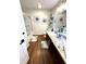 Modern bathroom featuring stylish vanity, granite countertops, and decorative wall art at 4414 Hickory Grove Blvd, Greenwood, IN 46143
