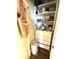 Organized walk-in closet with built-in shelves and storage solutions at 4414 Hickory Grove Blvd, Greenwood, IN 46143