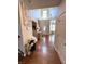 Welcoming foyer with high ceilings, hardwood floors, and elegant decor, creating a grand entrance to the home at 4414 Hickory Grove Blvd, Greenwood, IN 46143