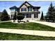 Beautiful two-story house with an expansive lawn and landscaping at 4414 Hickory Grove Blvd, Greenwood, IN 46143