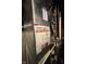Close-up of a furnace with visible model information and service details at 4414 Hickory Grove Blvd, Greenwood, IN 46143