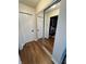 Hallway with closet doors and mirror slider doors at 4414 Hickory Grove Blvd, Greenwood, IN 46143