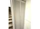 Hallway featuring carpet stairs and white closet doors at 4414 Hickory Grove Blvd, Greenwood, IN 46143