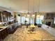 Modern kitchen with granite countertops, stainless appliances, and open shelving at 4414 Hickory Grove Blvd, Greenwood, IN 46143
