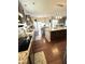 Open kitchen featuring granite counters, stainless appliances, and a seamless flow to the dining area at 4414 Hickory Grove Blvd, Greenwood, IN 46143