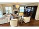 Beautiful living room with hardwood floors, a fireplace and a large entertainment center at 4414 Hickory Grove Blvd, Greenwood, IN 46143