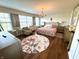 Charming main bedroom with a chandelier, and coordinated furnishings, providing a luxurious retreat at 4414 Hickory Grove Blvd, Greenwood, IN 46143