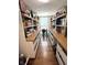 Functional pantry with ample shelving, storage, and hardwood floors at 4414 Hickory Grove Blvd, Greenwood, IN 46143