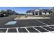 A well-maintained parking lot features handicap parking spot near a white building at 4414 Hickory Grove Blvd, Greenwood, IN 46143