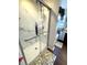 Modern shower with marble tile and glass enclosure, offering a spa-like experience at 4414 Hickory Grove Blvd, Greenwood, IN 46143