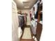 Spacious walk-in closet with ample storage, shelving, and shoe racks for organization at 4414 Hickory Grove Blvd, Greenwood, IN 46143