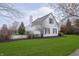 Exterior home with well-manicured lawn and a view of backyard fence at 443 Quincy Pl, Westfield, IN 46074