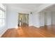 Open living area with hardwood floors, neutral tones, and large window at 443 Quincy Pl, Westfield, IN 46074