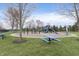 Outdoor playground featuring a variety of play structures and picnic tables for community enjoyment at 443 Quincy Pl, Westfield, IN 46074