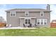 The backyard has a patio and plenty of grassy area for outdoor enjoyment at 474 Pekin Way, Pendleton, IN 46064