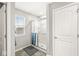 Bathroom features a glass-enclosed shower, neutral walls, and modern fixtures at 474 Pekin Way, Pendleton, IN 46064