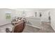 Upstairs living room features comfortable seating, a window for natural light, and access to other areas of the home at 474 Pekin Way, Pendleton, IN 46064