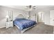 Spacious main bedroom features classic decor, bedside tables with lamps, and neutral carpeting at 474 Pekin Way, Pendleton, IN 46064