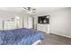 Comfortable main bedroom boasts a ceiling fan, modern decor, and neutral walls at 474 Pekin Way, Pendleton, IN 46064