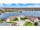 Picturesque waterfront community featuring stunning homes, lush greenery, and serene lake views at 4883 Snowberry Bay Ct, Carmel, IN 46033