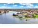 Wonderful aerial view of waterfront homes, lush greenery, and private boat docks at 4883 Snowberry Bay Ct, Carmel, IN 46033