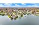 Desirable waterfront community offers a peaceful setting with scenic lake views and beautiful homes at 4883 Snowberry Bay Ct, Carmel, IN 46033