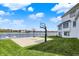Backyard view of basketball court and lake view at 4883 Snowberry Bay Ct, Carmel, IN 46033