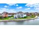 Stunning waterfront house with backyard pool, green space, and private access to the lake at 4883 Snowberry Bay Ct, Carmel, IN 46033