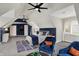 Bedroom with gray carpet, dark blue accent walls and lots of seating and natural light at 4883 Snowberry Bay Ct, Carmel, IN 46033