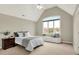 Bedroom featuring a large window seat, vaulted ceilings and a window with lots of natural light at 4883 Snowberry Bay Ct, Carmel, IN 46033
