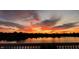 Beautiful panoramic view of a sunset over the lake, creating a scenic landscape at 4883 Snowberry Bay Ct, Carmel, IN 46033