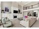 Bright living room with custom built-ins, fireplace, and comfortable seating at 4883 Snowberry Bay Ct, Carmel, IN 46033