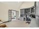 Spacious home office with custom built-ins and plenty of natural light at 4883 Snowberry Bay Ct, Carmel, IN 46033