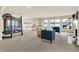 Spacious recreation room with trampoline, fireplace, and views of the lake at 4883 Snowberry Bay Ct, Carmel, IN 46033