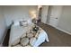 Bright bedroom with neutral walls, plush bedding, and stylish accents for a cozy, inviting atmosphere at 4912 Cayman Ct, Columbus, IN 47203