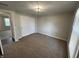 Cozy bedroom with natural light, closet and neutral carpet, creating a warm and inviting space at 4912 Cayman Ct, Columbus, IN 47203