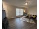 Inviting living room with stylish furniture, a large window, and a modern area rug at 4912 Cayman Ct, Columbus, IN 47203