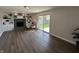 Inviting living room featuring a fireplace, built-in shelving, and sliding glass door to the backyard at 4912 Cayman Ct, Columbus, IN 47203