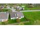 Aerial view of the backyard with lots of grass and an intact fence surrounding the yard at 4916 Franklin Villas Dr, Indianapolis, IN 46237