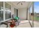 Relaxing sunroom featuring sliding glass doors that open to a backyard view, perfect for leisure at 4916 Franklin Villas Dr, Indianapolis, IN 46237