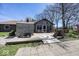Backyard featuring a large deck, beautiful landscaping, and a charming sunroom at 506 N County Road 900 E, Avon, IN 46123