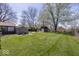 Large backyard with a patio, shed, gazebo, barn, firepit, and mature trees at 506 N County Road 900 E, Avon, IN 46123