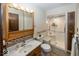 Bathroom featuring a glass-enclosed shower and wood cabinets at 506 N County Road 900 E, Avon, IN 46123