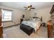 Bedroom featuring a queen sized bed and a ceiling fan at 506 N County Road 900 E, Avon, IN 46123